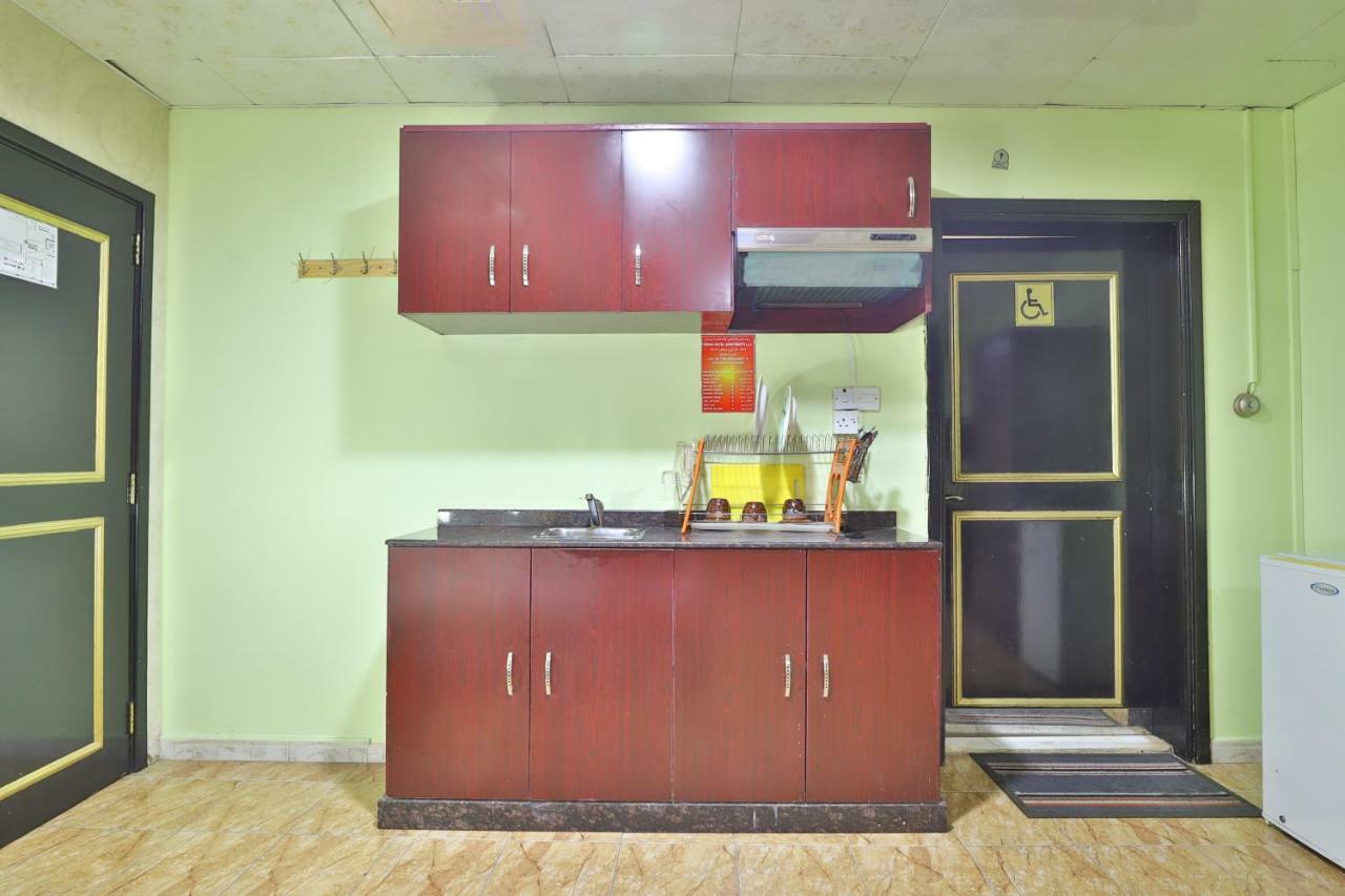 Oyo 261 Remas Hotel Apartment Дубай Екстериор снимка