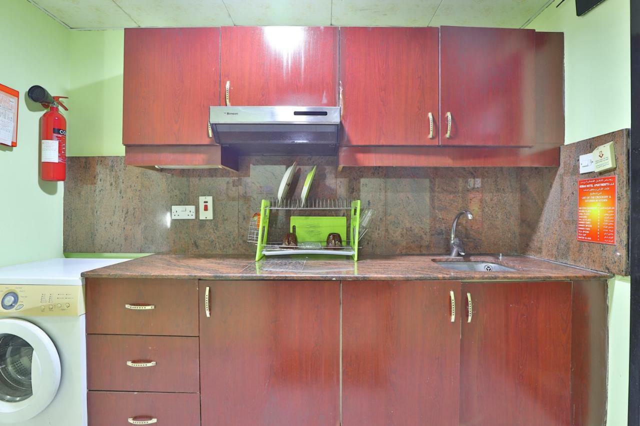 Oyo 261 Remas Hotel Apartment Дубай Екстериор снимка