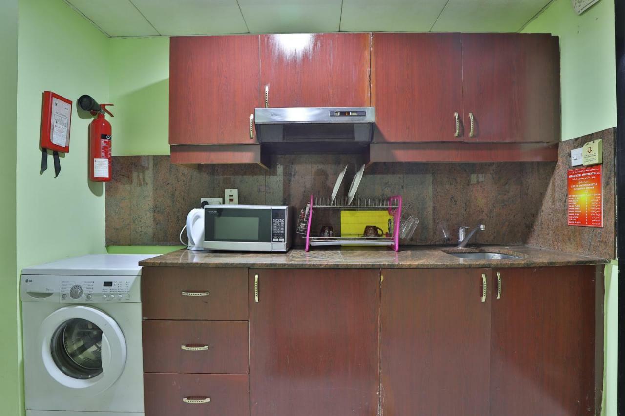 Oyo 261 Remas Hotel Apartment Дубай Екстериор снимка