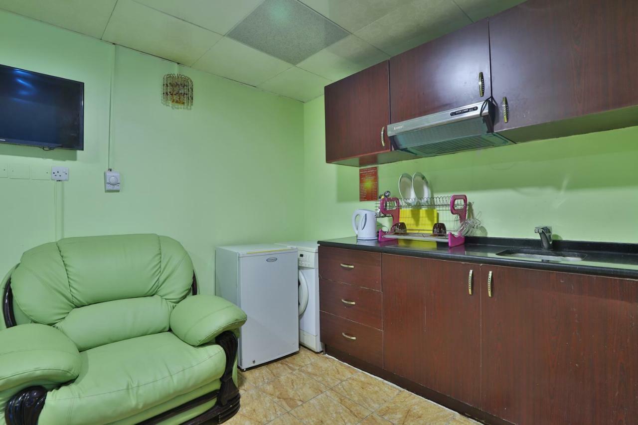 Oyo 261 Remas Hotel Apartment Дубай Екстериор снимка
